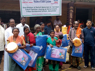 Tribal families in relief camp -  image Caritas