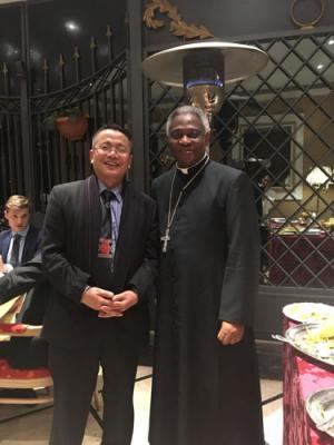 Kailean Khongsai with Cardinal Peter Turkson