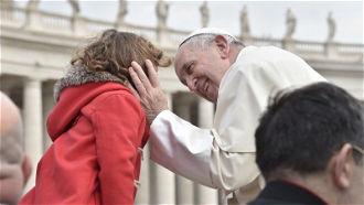 Pope greets young pilgrim
