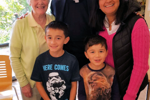 Fr Philip with Clare Richards and her family