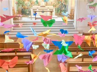 Origami butterflies with prayers