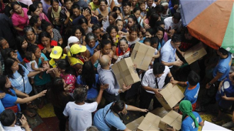 Relief supplies being distributed in Manila