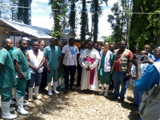 Bishop Sikuli at Mangina with Emmanuel Bofoe and Ebola doctors. Image: Emmanuel Bofoe