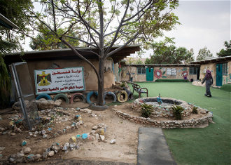 Khan al-Ahmar school,  built in 2009 with mud and used tyres, serves more than 150 students (aged 6-15) from five villages who have no other access to education.