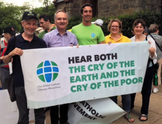 Scott Wright (left) with Catholic climate campaigners