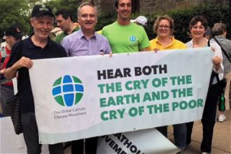 Scott Wright (left) with Catholic climate campaigners
