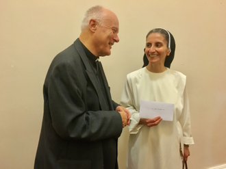 Fr Terry Tastard makes presentation to Sr Luma