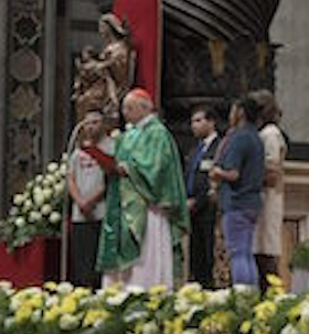 Cardinal Baldisseri reading