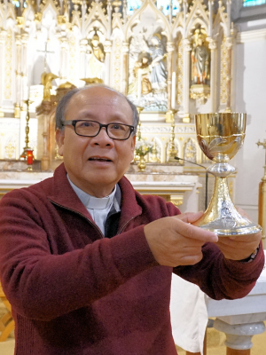 Fr Paul with new chalice. Image: Tony Walmsley.