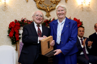 Sr Mary receives award from President Higgins