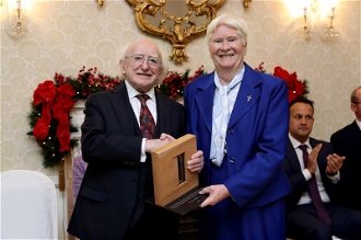 Sr Mary receives award from President Higgins