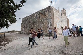 Ecumenical accompaniers visit Iqrit, a Christian village near Acre in Israel that was razed to the ground in 1951. Photo: Albin Hillert/WCC