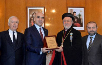 Mayor Kerimoglu with Bishop Cetin