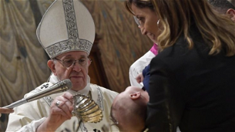 Pope baptises newborn - image Vatican Media