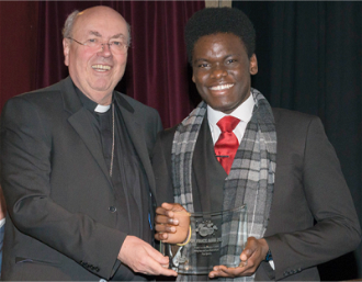 Archbishop McMahon with Aaron Omotosho