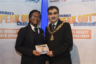 Mayor of Brent Cllr Arshad Mahmood presents Princilla with her prize