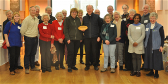 Canon Anthony Dwyer and parishioners with the Award - image  Mike Moroney
