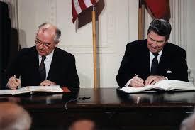 Reagan and Gorbachev signing INF Treaty - image White House