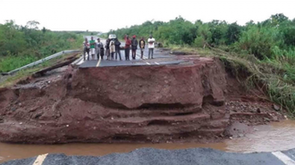 In Beira, Mozambique Cyclone Idai washed away part of main road. Many communities are cut off by flooding