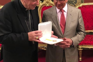 Cardinal presents Benemerenti medal to Michael Milbourn