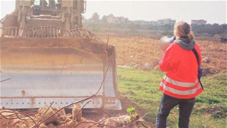 Photo by Joe Carr who worked with International Solidarity Movement (ISM) in Gaza and CPT in Hebron and At-Tuwani.  His photos showing the bulldozer running over Corrie was not enough to convict the driver of her death.