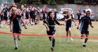 Sacred Heart pupils on running track