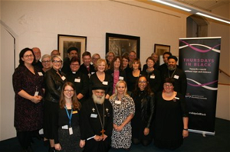 Participants of NCC roundtable on domestic & family violence mark Thursdays in Black. Photo: NCCA