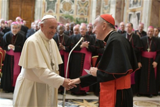 Pope is greeted by Secretary of State, Cardinal Pietro Parolin