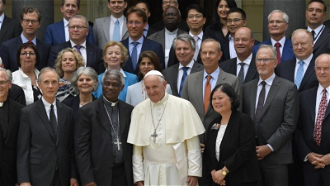 Pope Francis with Cardinal Turkson and oil CEOs