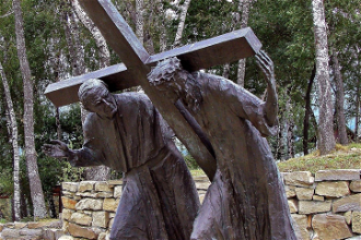 Fifth Station of the Cross, Via Crucis, Pasierbiec, Poland. John Paul II is modelled as Simon of Cyrene