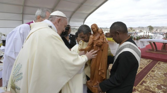 Pope blesses a statue. Image: Vatican Media