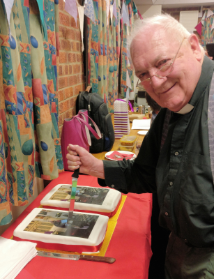 Fr Francis with his retirement cake