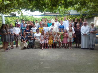 Bishop Jacek with summer camp group