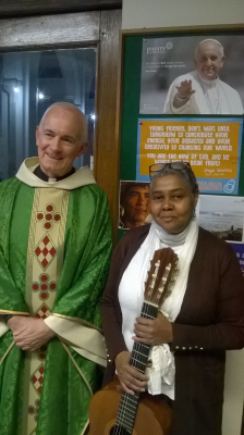 Fr David with musician Leila Persaud who performed during the Mass