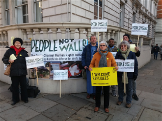 Demonstrators outside French Embassy in London