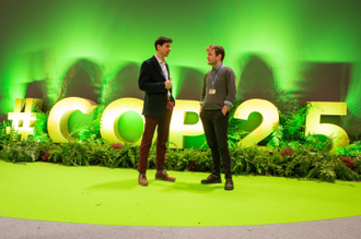 Robin Mace-Snaith and Charlie Bennett at COP 25 - image Liam Finn /CAFOD