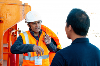 Stella Maris port chaplain with seafarer