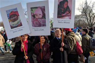 Reggie Littlejohn with Anni Zhang and her father Lin Zhang at 2019 March for Life