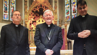 Canon Stephen Wright and Canon David Evans with Archbishop Longley