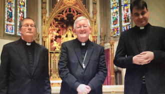 Canon Stephen Wright and Canon David Evans with Archbishop Longley