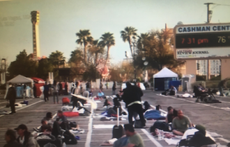Homeless bed down for the night in Las Vegas carpark - near empty offices and hotels