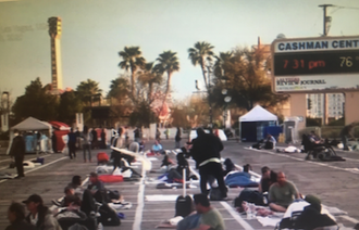 Homeless bed down for the night in  Las Vegas carpark - near empty offices and hotels