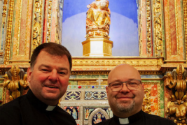 Rector Canon Paul Farrer and vice-rector Fr Damian Cassidy O.Carm. beneath 400-year-old statue of Our Lady Vulnerata.