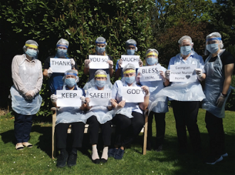 Staff at Georgian House Care Home Ealing, wearing St Benedict's PPE