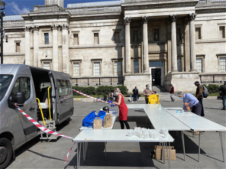 Volunteers setting up in Trafalgar Square