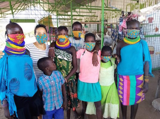 Cecilia, Lilian  and friends model colourful masks