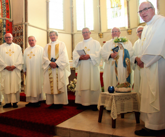 Fr Peter is 3rd from left after Mass of Thanksgiving to celebrate his 80th birthday at St Peter's Church, South Bank, 2016 - Photo Michael Clark.