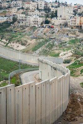 'Separation Wall' which has already taken large chunks of  West Bank land and property