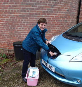 Maureen Thomson plugging in her Leaf