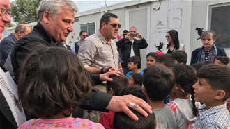 Cardinal Konrad Krajewski welcomes group of refugee children (December 2019)